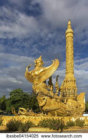 Thung Si Muang Park, Mueang, Garuda figure in front of the Golden Giant Candle, Candle Monument, Ubon Ratchathani, Isan, Isaan, Thailand, Asia View Large Photo Image Stock Photography - Thung Si Muang Park, Mueang, Garuda figure in front of the Golden Giant Candle, Candle Monument, Ubon Ratchathani, Isan, Isaan, Thailand, Asia. Fotosearch