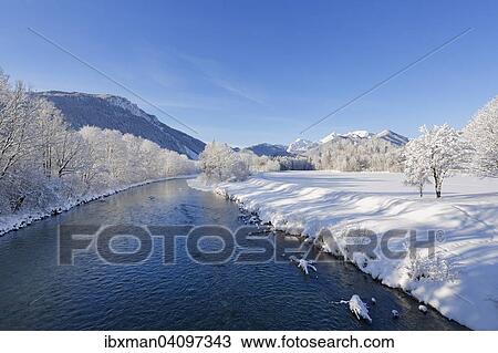 Stock Image - Tiroler Achen with Gscheuerwand and Geigelstein, Schleching, Chiemgau, Upper Bavaria, Bavaria, Germany, Europe. Fotosearch