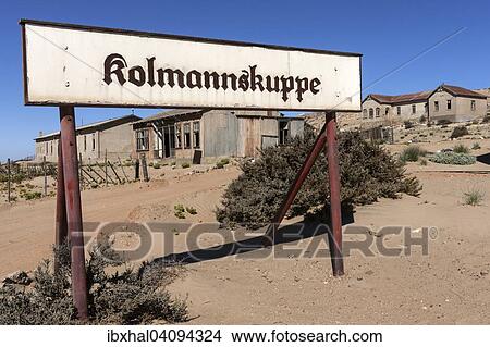 Town sign of Kolmannskuppe, former diamond town, now a ghost town, Kolmanskop, Kolmannskuppe, near Luderitz, Namibia, Africa View Large Photo Image Picture - Town sign of Kolmannskuppe, former diamond town, now a ghost town, Kolmanskop, Kolmannskuppe, near Luderitz, Namibia, Africa. Fotosearch
