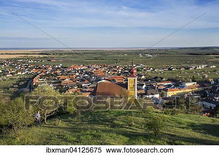 Town View with Mountain Church of St. Martin and Lake Neusiedl, Donnerskirchen, Northern Burgenland, Burgenland, Austria, Europe View Large Photo Image Stock Photography - Town View with Mountain Church of St. Martin and Lake Neusiedl, Donnerskirchen, Northern Burgenland, Burgenland, Austria, Europe. Fotosearch