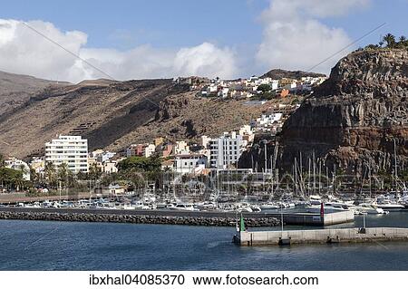 Townscape and port, San Sebastian, La Gomera, Canary Islands, Spain, Europe View Large Photo Image Stock Image - Townscape and port, San Sebastian, La Gomera, Canary Islands, Spain, Europe. Fotosearch