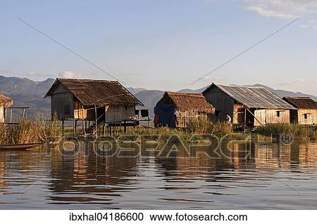 Traditional stilt houses on the Inle Lake, evening light, Shan State, Myanmar, Asia View Large Photo Image Stock Image - Traditional stilt houses on the Inle Lake, evening light, Shan State, Myanmar, Asia. Fotosearch