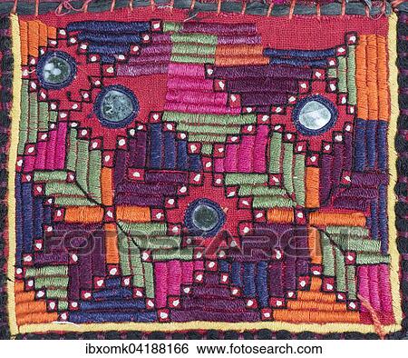 Traditional wall hangings from Rajasthan, colourful, with mirrors and different patterns, detail, Udaipur, Rajasthan, India, Asia View Large Photo Image Stock Photograph - Traditional wall hangings from Rajasthan, colourful, with mirrors and different patterns, detail, Udaipur, Rajasthan, India, Asia. Fotosearch