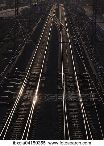 Stock Photography - Train tracks in bright sunlight, Frankfurt am Main, Hesse, Germany, Europe. Fotosearch