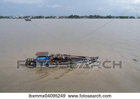 Transport ship on the Mekong River, Mekong Delta, Vietnam Asia View Large Photo Image Stock Photo - Transport ship on the Mekong River, Mekong Delta, Vietnam Asia. Fotosearch