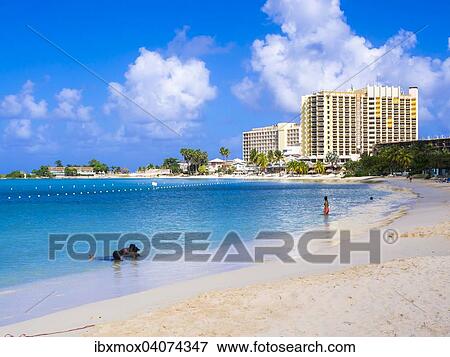 Stock Photo - Turtle Beach, Jamaica Grande Hotel at the back, Ocho Rios, Saint Ann Parish, Jamaica, North America. Fotosearch