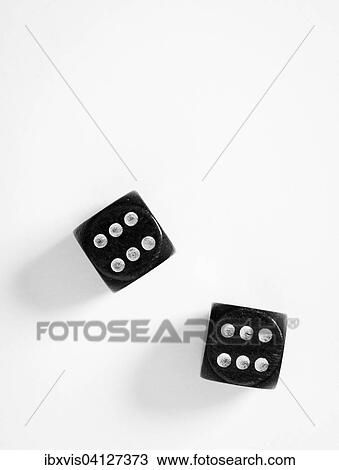 Stock Image - Two black dice, double sixes. Fotosearch