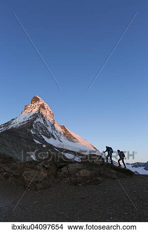 Two mountaineers ascending the Matterhorn, Zermatt, Canton of Valais, Switzerland, Europe View Large Photo Image Picture - Two mountaineers ascending the Matterhorn, Zermatt, Canton of Valais, Switzerland, Europe. Fotosearch