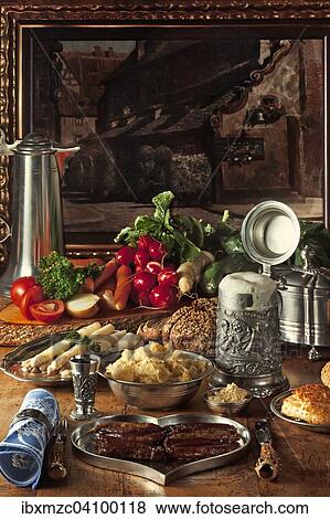 Typical Franconian food, Nuremberg sausages with asparagus and fresh vegetables on decorated pewter dishes, Middle Franconia, Bavaria, Germany, Europe View Large Photo Image Stock Photo - Typical Franconian food, Nuremberg sausages with asparagus and fresh vegetables on decorated pewter dishes, Middle Franconia, Bavaria, Germany, Europe. Fotosearch
