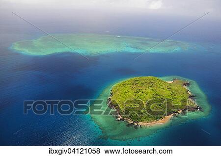 Uninhabited island with coral reef, near Grande Terre island, Mayotte, Africa View Large Photo Image Stock Photo - Uninhabited island with coral reef, near Grande Terre island, Mayotte, Africa. Fotosearch