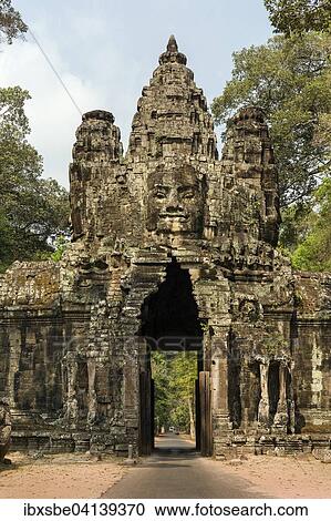 Victory Gate in the east of Angkor Thom, Avalokiteshvara face tower, east view, Angkor Thom, Siem Reap, Cambodia, Asia View Large Photo Image Stock Image - Victory Gate in the east of Angkor Thom, Avalokiteshvara face tower, east view, Angkor Thom, Siem Reap, Cambodia, Asia. Fotosearch