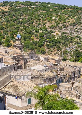 View across the roofs, Ragusa Ibla, UNESCO World Heritage Site, Val di Noto, Sicily, Italy, Europe View Large Photo Image Stock Photo - View across the roofs, Ragusa Ibla, UNESCO World Heritage Site, Val di Noto, Sicily, Italy, Europe. Fotosearch