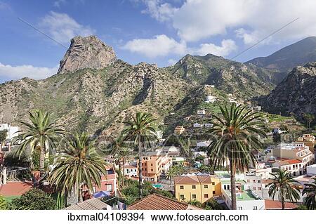 View across Vallehermoso to the Roque Cano, La Gomera, Canary Islands, Spain, Europe View Large Photo Image Picture - View across Vallehermoso to the Roque Cano, La Gomera, Canary Islands, Spain, Europe. Fotosearch