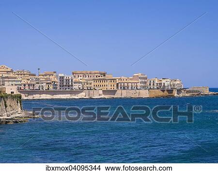 View from Castello Maniace onto Syracuse, Piazza Federico de Sveia d'Ortigia, UNESCO World Heritage Site, Syracuse, island of Ortigia, Sicily, Italy, Europe View Large Photo Image Picture - View from Castello Maniace onto Syracuse, Piazza Federico de Sveia d'Ortigia, UNESCO World Heritage Site, Syracuse, island of Ortigia, Sicily, Italy, Europe. Fotosearch