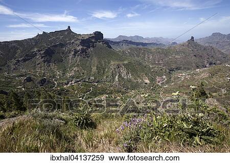 View from Cruz de Tejeda to the mountains, to Barranco de Tejeda and to Roque Bentayga, Gran Canaria, Canary Islands, Spain, Europe View Large Photo Image Stock Photo - View from Cruz de Tejeda to the mountains, to Barranco de Tejeda and to Roque Bentayga, Gran Canaria, Canary Islands, Spain, Europe. Fotosearch