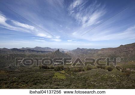 View from Cruz de Tejeda to the mountains, to Barranco de Tejeda and to Roque Bentayga, Gran Canaria, Canary Islands, Spain, Europe View Large Photo Image Stock Photograph - View from Cruz de Tejeda to the mountains, to Barranco de Tejeda and to Roque Bentayga, Gran Canaria, Canary Islands, Spain, Europe. Fotosearch