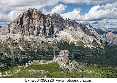 Stock Photograph - View from hiking area on the Nuvolau mountain on rock group Cinque Torri, in back Tofana di Rozes, Fanes group, Dolomites, Cortina d'Ampezzo, Veneto, Italy, Europe. Fotosearch