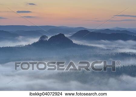 View from Kleiner Winterberg mountain to the Lorenz Stones at dawn, Elbe Sandstone Mountains, Saxon Switzerland, Saxony, Germany, Europe View Large Photo Image Picture - View from Kleiner Winterberg mountain to the Lorenz Stones at dawn, Elbe Sandstone Mountains, Saxon Switzerland, Saxony, Germany, Europe. Fotosearch