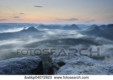 View from Kleiner Winterberg mountain at dawn, Elbe Sandstone Mountains, Saxon Switzerland, Saxony, Germany, Europe View Large Photo Image Stock Image - View from Kleiner Winterberg mountain at dawn, Elbe Sandstone Mountains, Saxon Switzerland, Saxony, Germany, Europe. Fotosearch