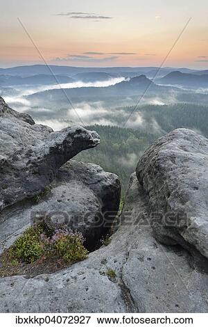 Stock Photo - View from Kleiner Winterberg mountain at dawn, Elbe Sandstone Mountains, Saxon Switzerland, Saxony, Germany, Europe. Fotosearch