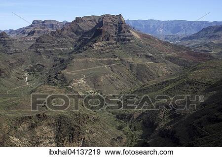 Stock Photo - View from Mirador Degollada de Las Yeguas to Barranco de Fataga, Gran Canaria, Canary Islands, Spain, Europe. Fotosearch