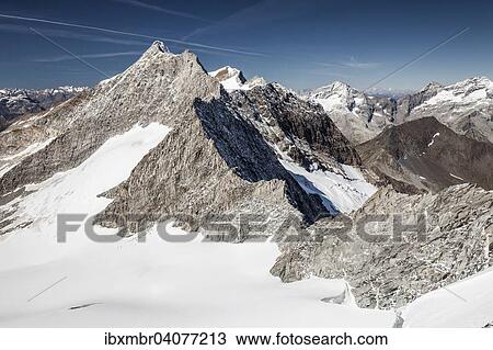 Stock Image - View from Mt Hoher Weisszint of Mt Hochfeiler, Zillertal Alps, Lappach, Muhlwald Valley, Tauferer Ahrntal Valley, Puster Valley, South Tyrol, Italy, Finkenberg, Tyrol, Austria, Europe. Fotosearch
