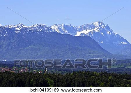 View from Peretshofener Hohe of Konigsdorf and the pre Alps to Zugspitze, Upper Bavaria, Bavaria, Germany, Europe View Large Photo Image Stock Photo - View from Peretshofener Hohe of Konigsdorf and the pre Alps to Zugspitze, Upper Bavaria, Bavaria, Germany, Europe. Fotosearch