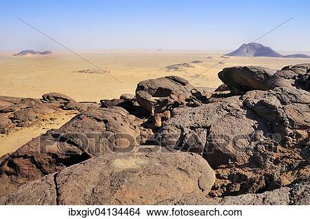 Picture - View from the Aicha monolith to the second largest monolith in the world, Ben Amira, Adrar region, Mauritania, Africa. Fotosearch