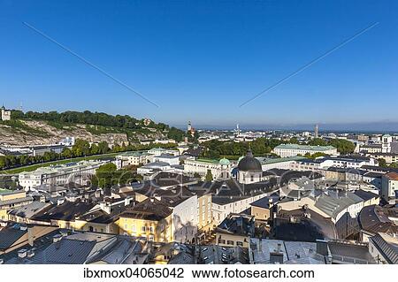 View from the Kapuzinerberg on the Neustadt with Church of the Holy Trinity, Hotel Bristol and Mirabell Palace, Salzburg, Salzburg State, Austria, Europe View Large Photo Image Stock Image - View from the Kapuzinerberg on the Neustadt with Church of the Holy Trinity, Hotel Bristol and Mirabell Palace, Salzburg, Salzburg State, Austria, Europe. Fotosearch