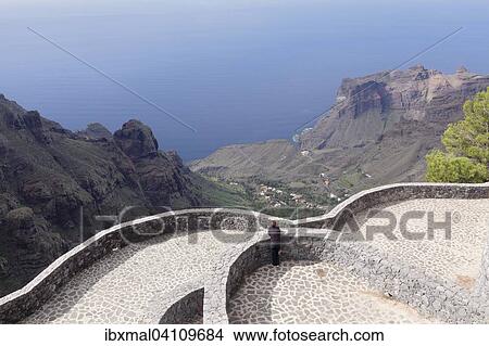 View from the Mirador de Santo into the valley of Tagaluche, Arure, La Gomera, Canary Islands, Spain, Europe View Large Photo Image Picture - View from the Mirador de Santo into the valley of Tagaluche, Arure, La Gomera, Canary Islands, Spain, Europe. Fotosearch
