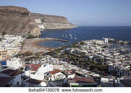 View from the Mirador towards Puerto de Mogan with marina and coast, Gran Canaria, Canary Islands, Spain, Europe View Large Photo Image Stock Photograph - View from the Mirador towards Puerto de Mogan with marina and coast, Gran Canaria, Canary Islands, Spain, Europe. Fotosearch