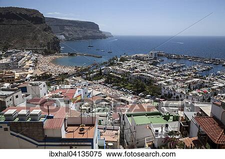 View from the Mirador towards Puerto de Mogan with marina and coast, Gran Canaria, Canary Islands, Spain, Europe View Large Photo Image Stock Photography - View from the Mirador towards Puerto de Mogan with marina and coast, Gran Canaria, Canary Islands, Spain, Europe. Fotosearch