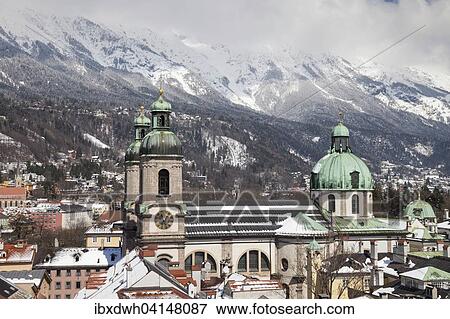 View from the town tower onto the city with the cathedral and the Karwendel Mountains, Innsbruck, Tyrol, Austria, Europe View Large Photo Image Stock Photo - View from the town tower onto the city with the cathedral and the Karwendel Mountains, Innsbruck, Tyrol, Austria, Europe. Fotosearch