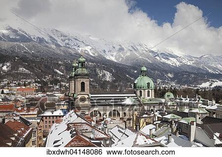View from the town tower onto the city with the cathedral and the Karwendel Mountains, Innsbruck, Tyrol, Austria, Europe View Large Photo Image Stock Photograph - View from the town tower onto the city with the cathedral and the Karwendel Mountains, Innsbruck, Tyrol, Austria, Europe. Fotosearch