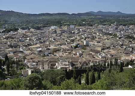 Stock Photo - View of the historic centre from the Santuari de Sant Salvador fortress, Arta, Majorca, Balearic Islands, Spain, Europe. Fotosearch
