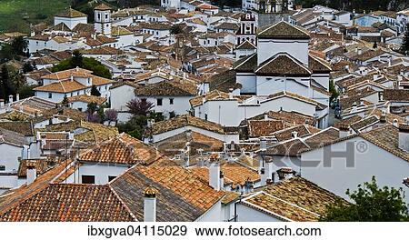 View over the rooftops of the white village, Pueblo Blanco, Grazalema, Sierra de Grazalema Natural Park, Cadiz province, Andalucia, Spain, Europe View Large Photo Image Stock Photo - View over the rooftops of the white village, Pueblo Blanco, Grazalema, Sierra de Grazalema Natural Park, Cadiz province, Andalucia, Spain, Europe. Fotosearch