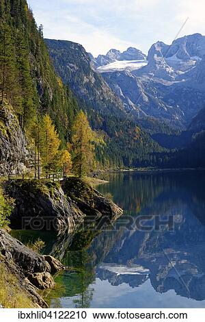 Stock Image - Vorderer Gosausee lake, Dachstein behind, Dachstein Mountains, Gosau, Salzkammergut, Upper Austria, Austria, Europe. Fotosearch