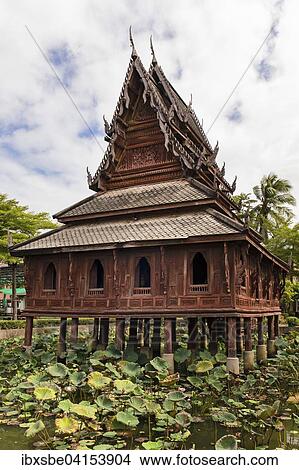 Wat Thung Si Mueang, monastery library, wooden temple, lotus pond, Muang, Ubon Ratchathani, Isan, Isaan, Thailand, Asia View Large Photo Image Picture - Wat Thung Si Mueang, monastery library, wooden temple, lotus pond, Muang, Ubon Ratchathani, Isan, Isaan, Thailand, Asia. Fotosearch