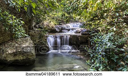 Stock Image - Waterfall in Erawan National Park, Kanchanaburi Province, Thailand, Asia. Fotosearch