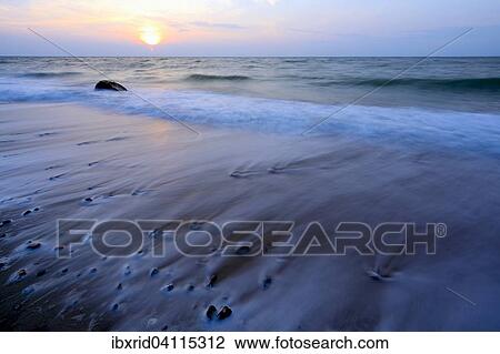 Stock Image - Wave on the Baltic Sea beach, Fehmarn, Schleswig-Holstein, Germany, Europe. Fotosearch