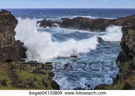 Waves crashing on the rocks, Rapa Nui National Park, Easter Island, Chile, South America View Large Photo Image Stock Photo - Waves crashing on the rocks, Rapa Nui National Park, Easter Island, Chile, South America. Fotosearch