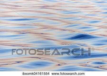 Picture - Waves in the evening light, sea, Denmark Strait, Greenland, North America. Fotosearch