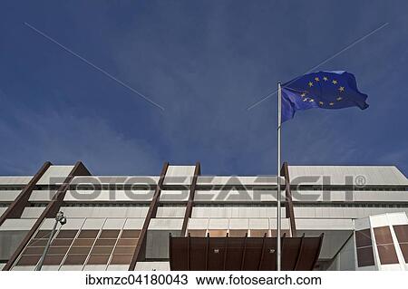 Waving Europe flag in front of the building of the Council of Europe, Strasbourg, Alsace, France, Europe View Large Photo Image Stock Image - Waving Europe flag in front of the building of the Council of Europe, Strasbourg, Alsace, France, Europe. Fotosearch