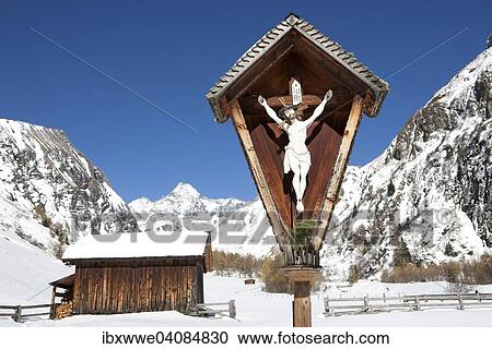 Stock Image - Wayside shrine with Mt Grossglockner, High Tauern National Park, Kodnitztal, Kals am Grossglockner, Tyrol, Austria, Europe. Fotosearch