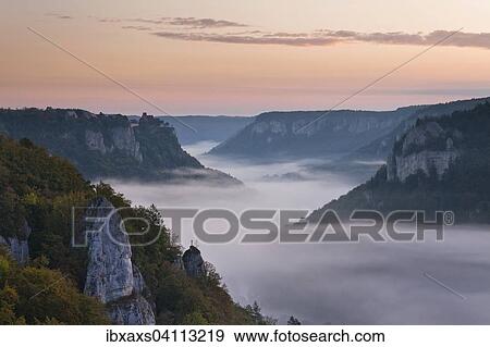 Stock Photo - Werenwag Castle above the fog in the morning, Upper Danube Valley, Beuron, Baden-Wurttemberg, Germany, Europe. Fotosearch