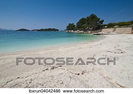 White sand beach and turquoise water at Ksamil, Albania, Europe View Large Photo Image Stock Photograph - White sand beach and turquoise water at Ksamil, Albania, Europe. Fotosearch