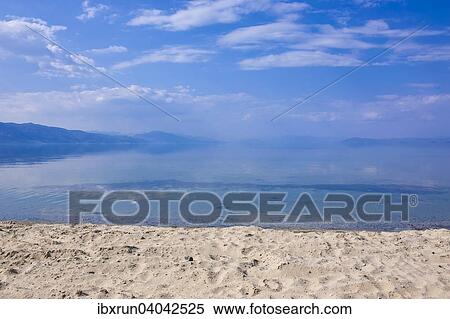 Stock Photography - White sand beach on Lake Ohrid, Albania, Europe. Fotosearch