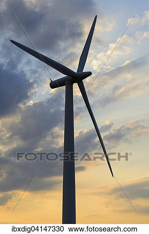 Wind turbine silhouette against a dusk sky, United Kingdom, Europe View Large Photo Image Stock Image - Wind turbine silhouette against a dusk sky, United Kingdom, Europe. Fotosearch