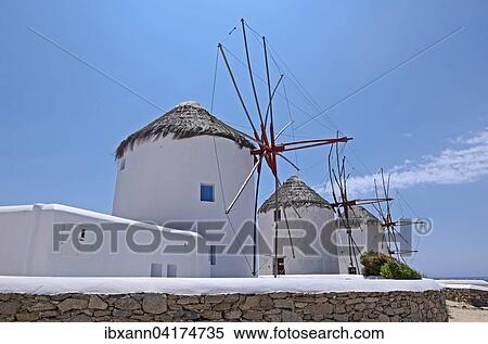 Windmills of Mykonos Chora, Cyclades, Greece, Europe View Large Photo Image Stock Photography - Windmills of Mykonos Chora, Cyclades, Greece, Europe. Fotosearch