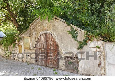 Wine cellar in a Kellergasse, a lane with wine cellars, Gols, Northern Burgenland, Burgenland, Austria, Europe View Large Photo Image Stock Photograph - Wine cellar in a Kellergasse, a lane with wine cellars, Gols, Northern Burgenland, Burgenland, Austria, Europe. Fotosearch